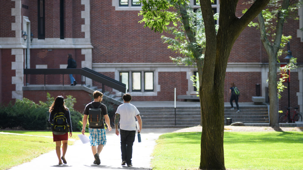 students walking towards building